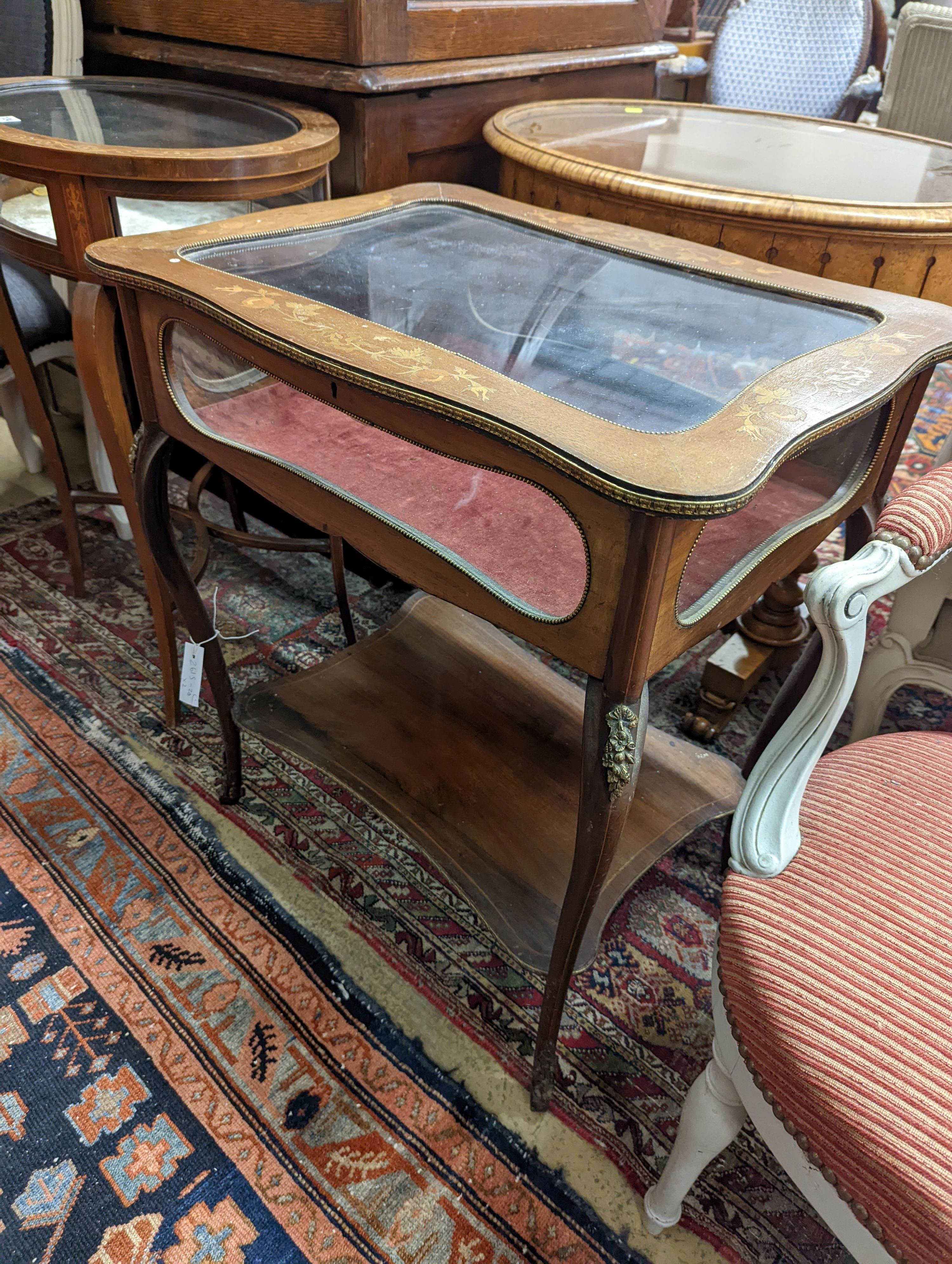 An oval marquetry inlaid mahogany bijouterie table, together with a larger rectangular bijouterie table, larger width 64cm, depth 46cm, height 72cm